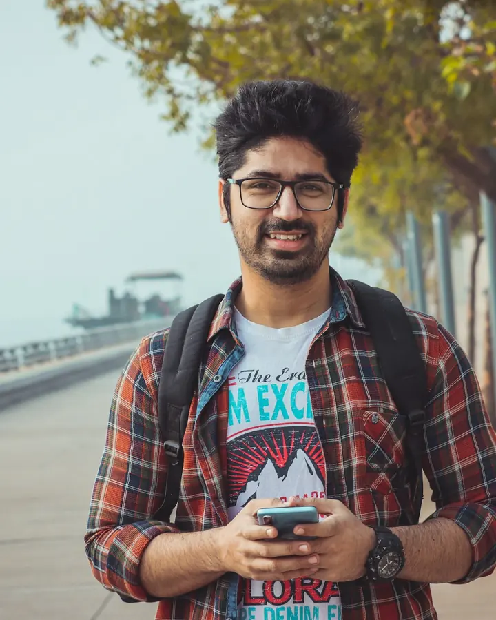 Student checking internships on his phone